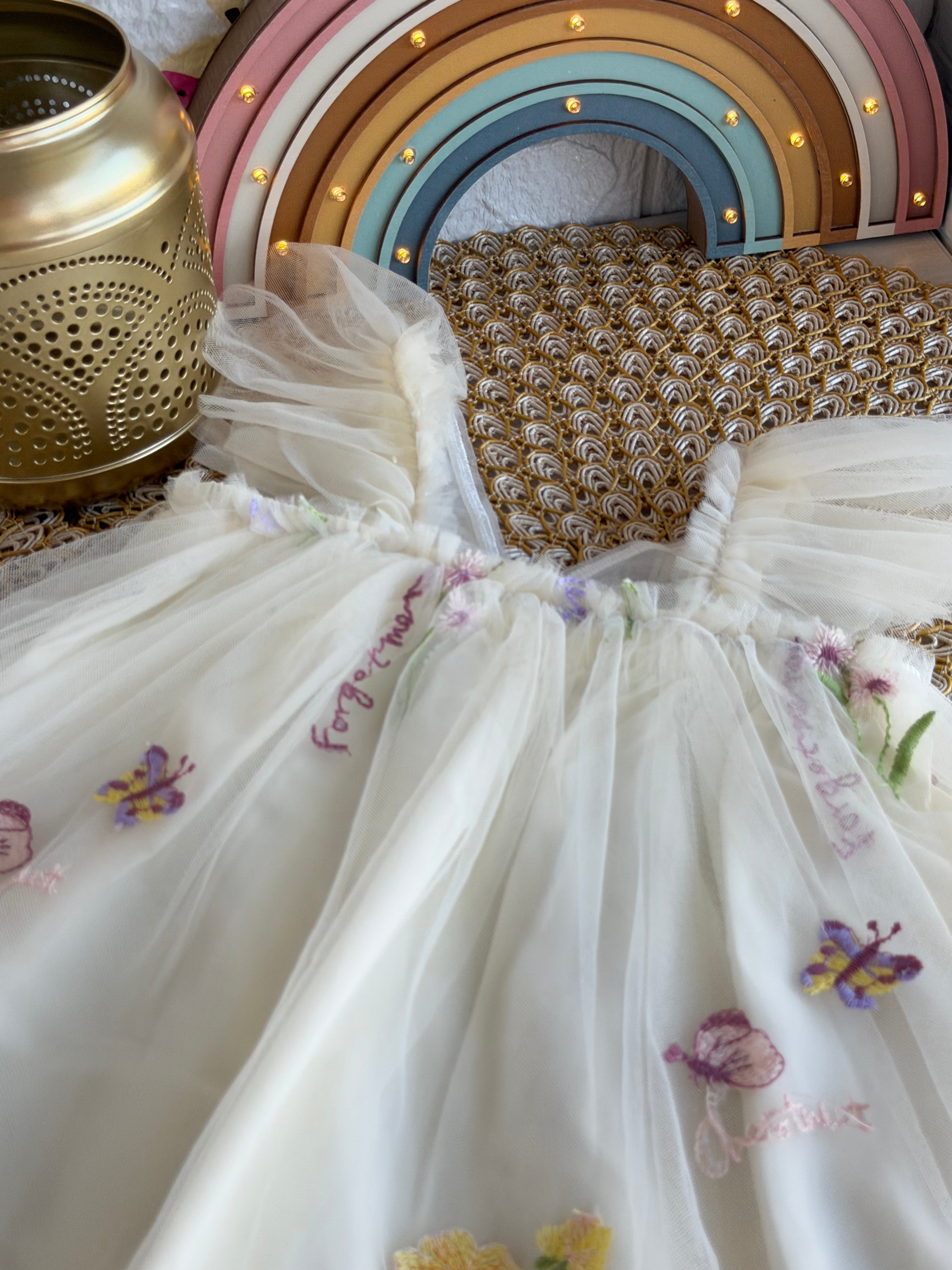 Vestido tull crema alas mariposa