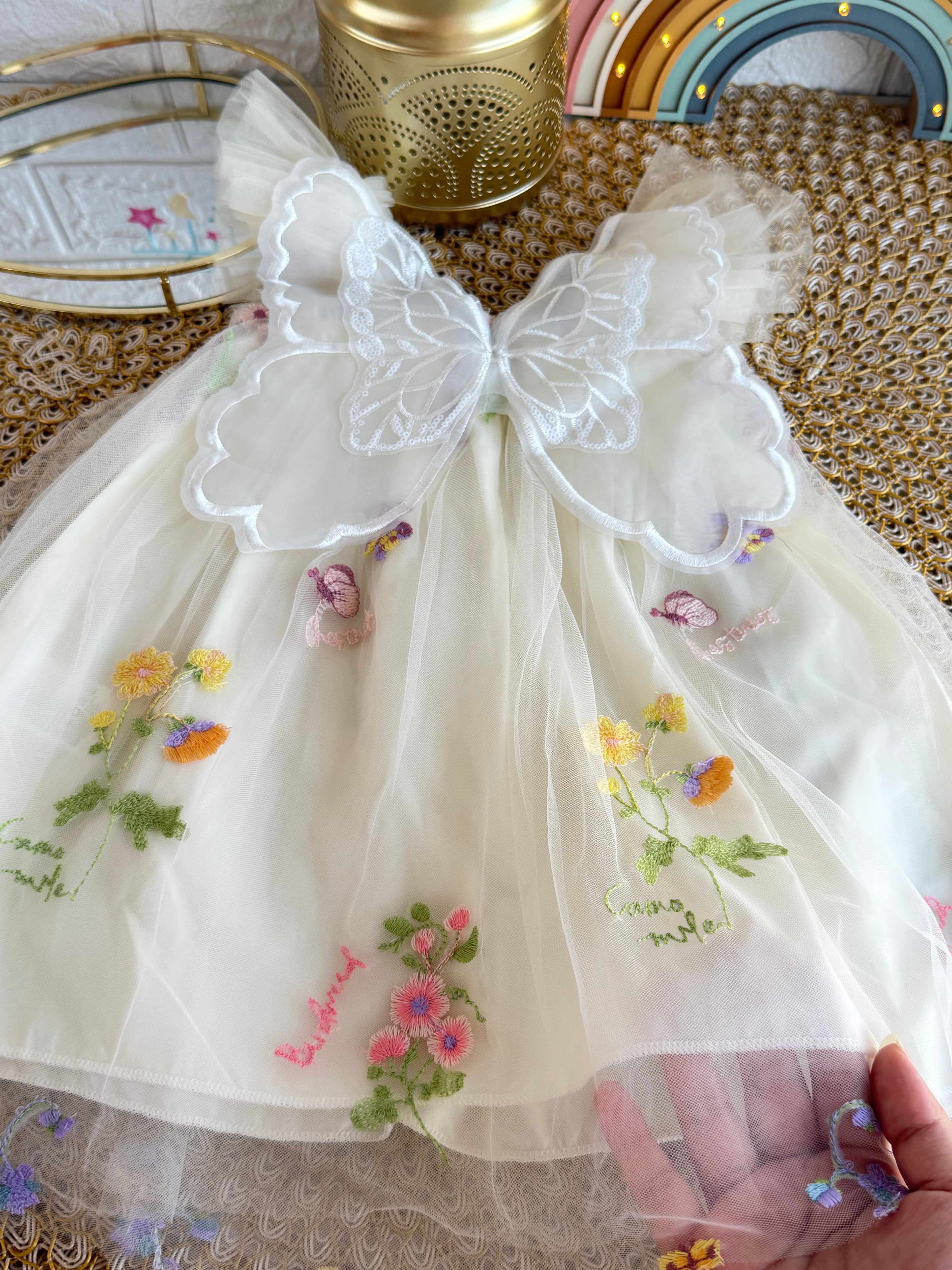 Vestido tull crema alas mariposa