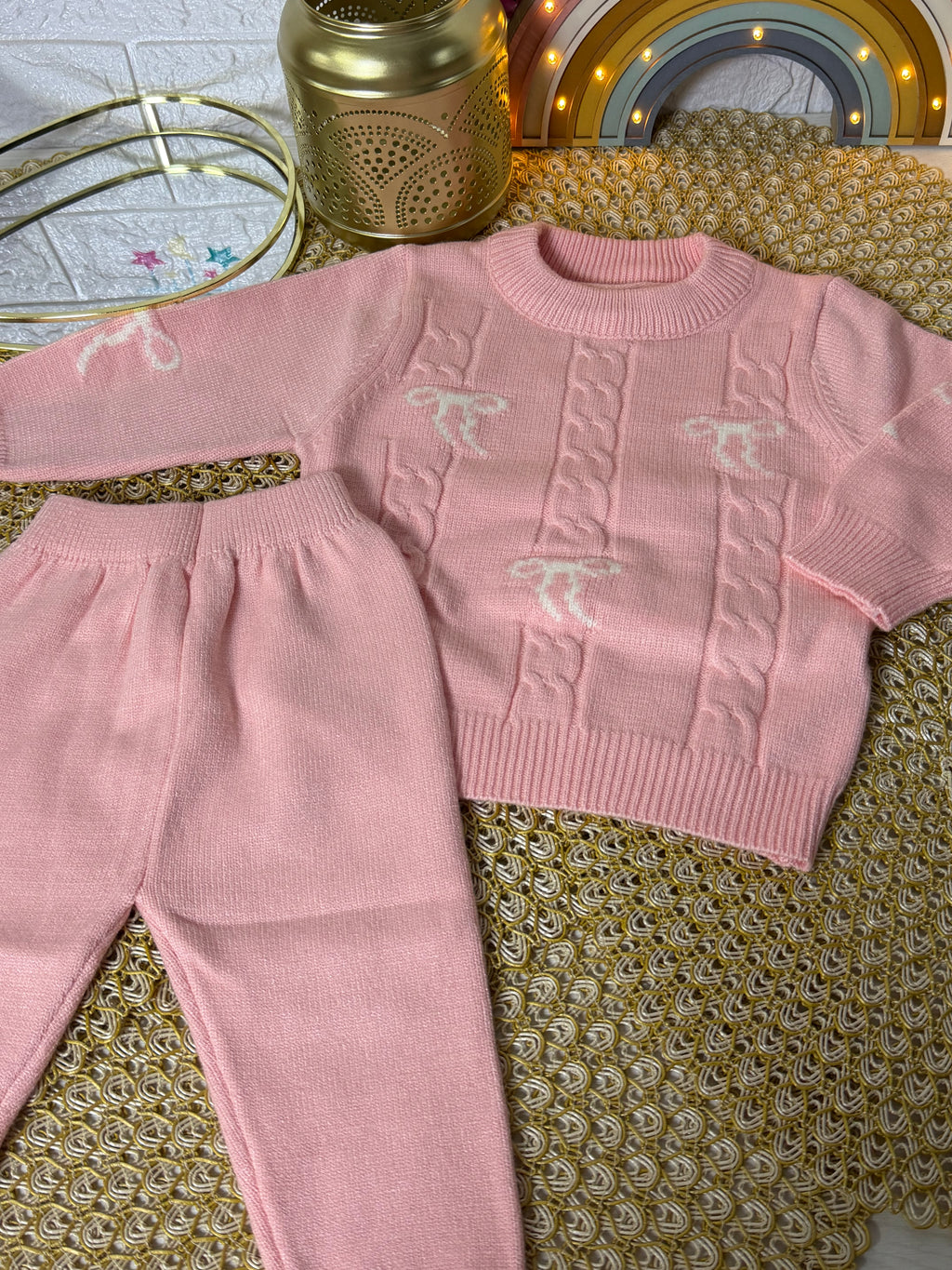 Conjunto tejido rosa lazos