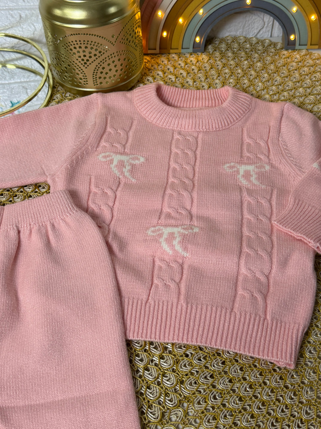 Conjunto tejido rosa lazos