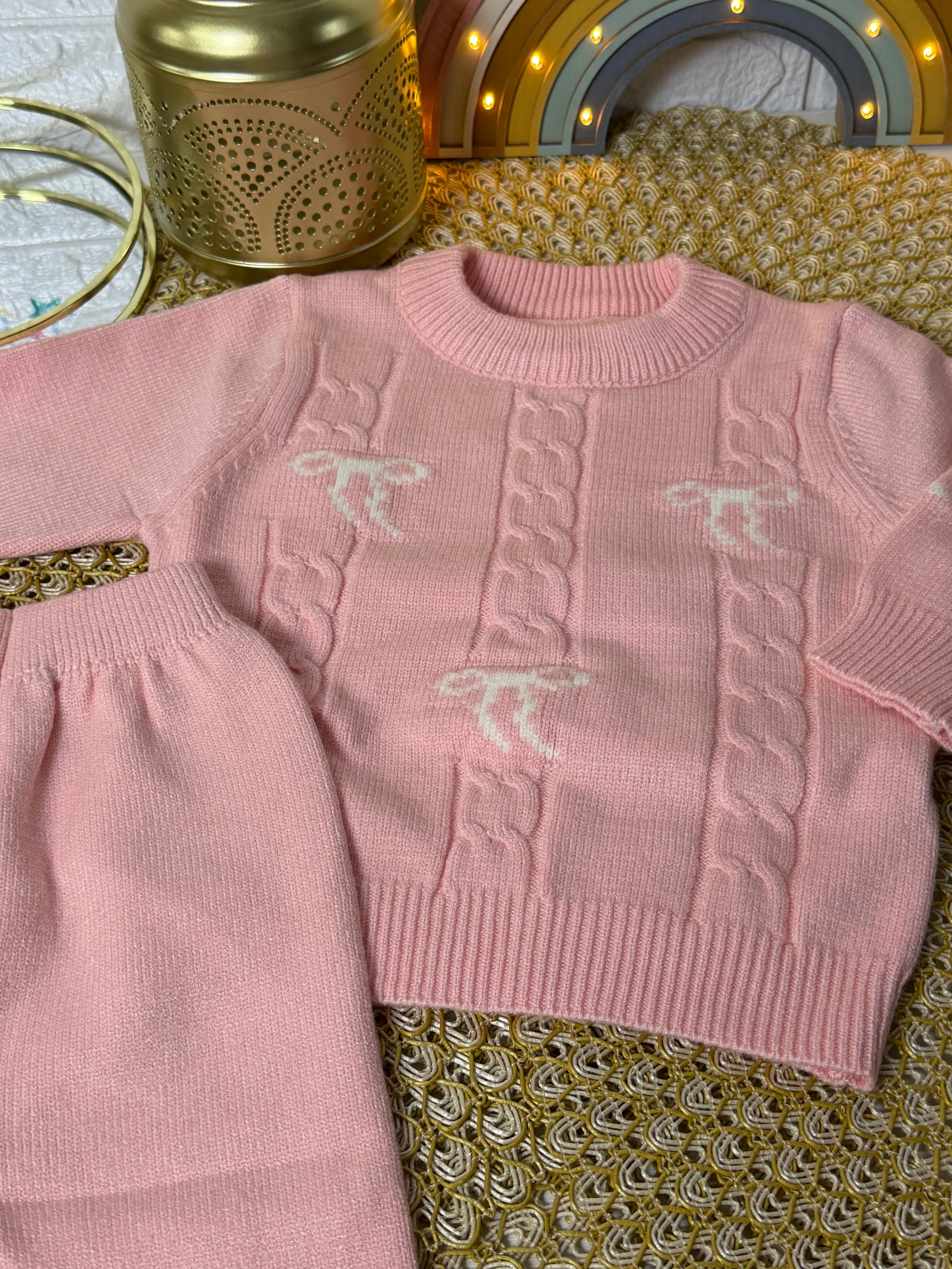 Conjunto tejido rosa lazos