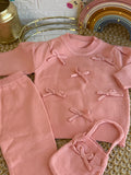 Conjunto tejido rosa con bolsito