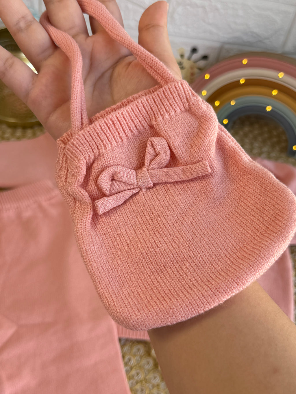 Conjunto tejido rosa con bolsito