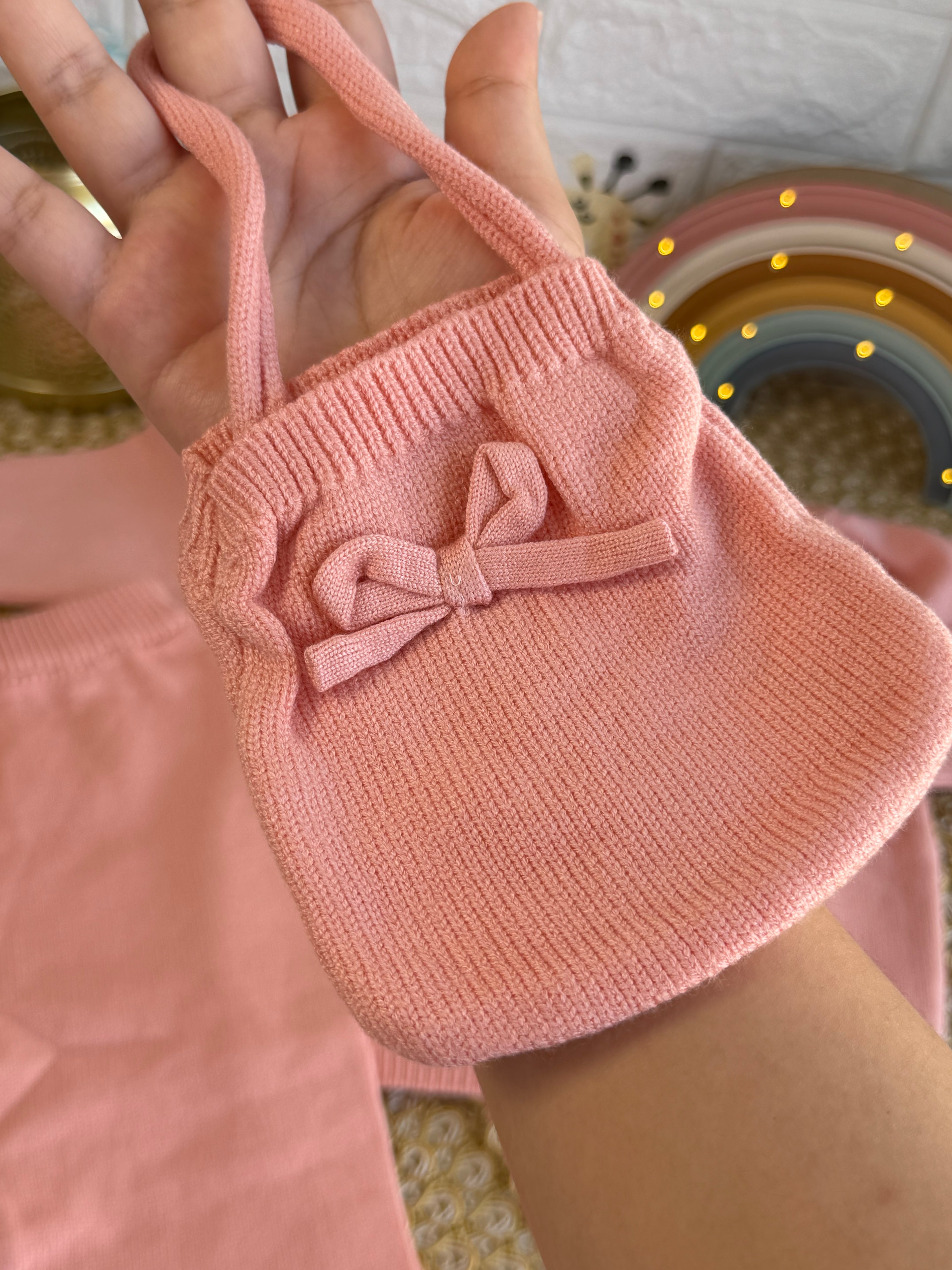 Conjunto tejido rosa con bolsito