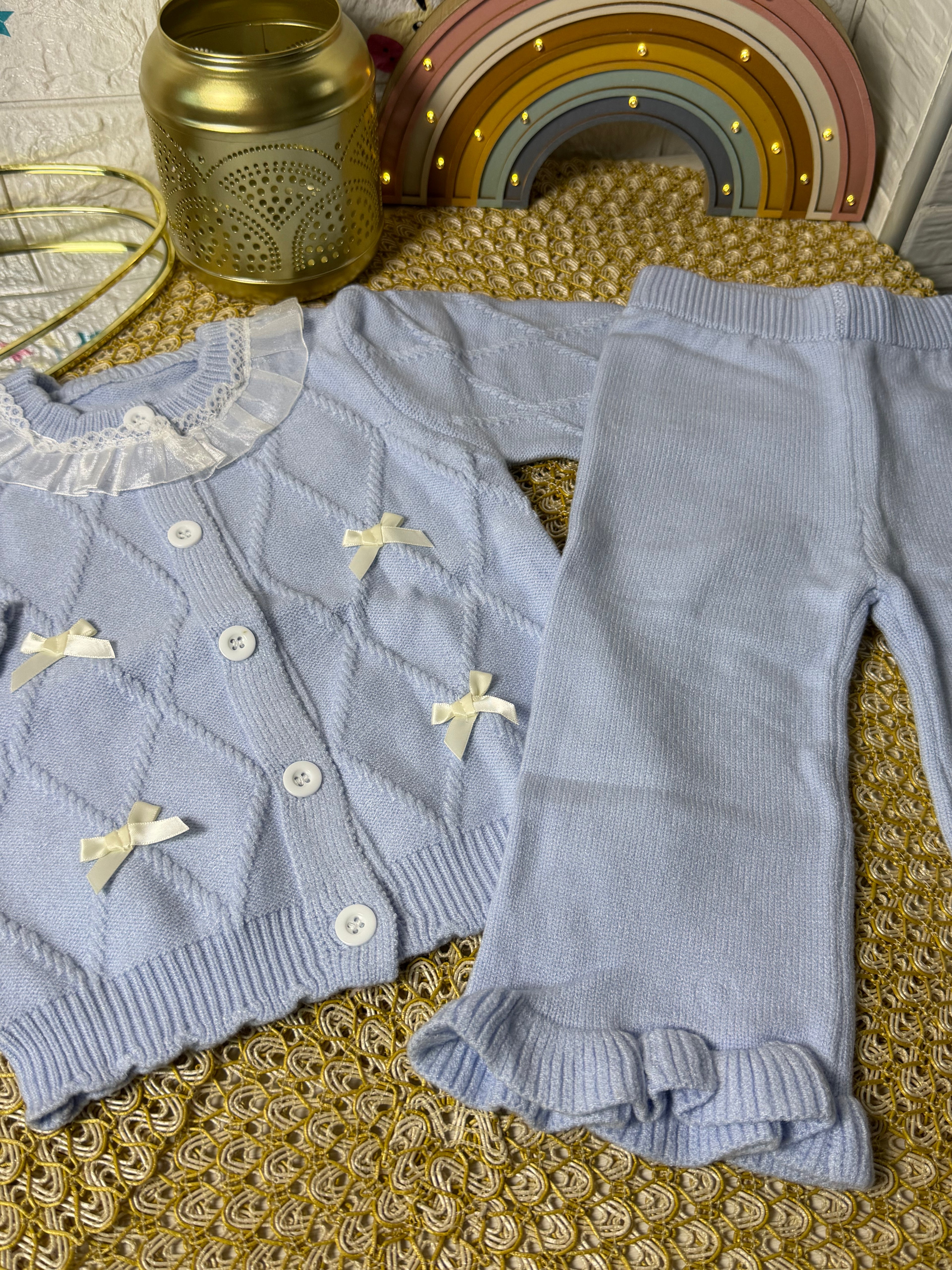 Conjunto tejido celeste lazos