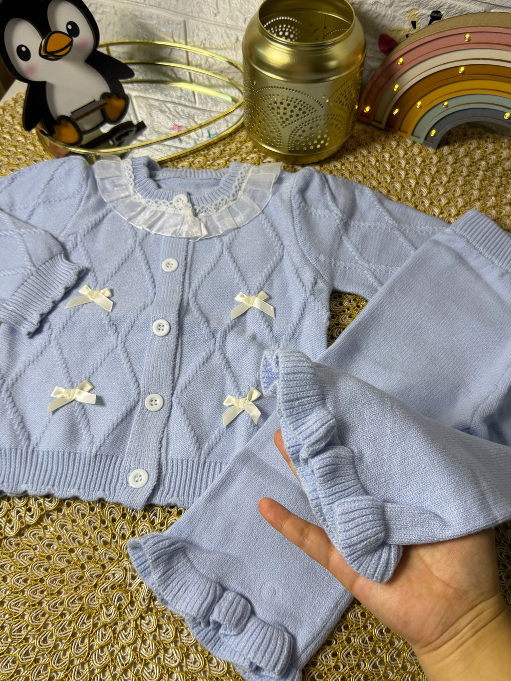 Conjunto tejido celeste lazos