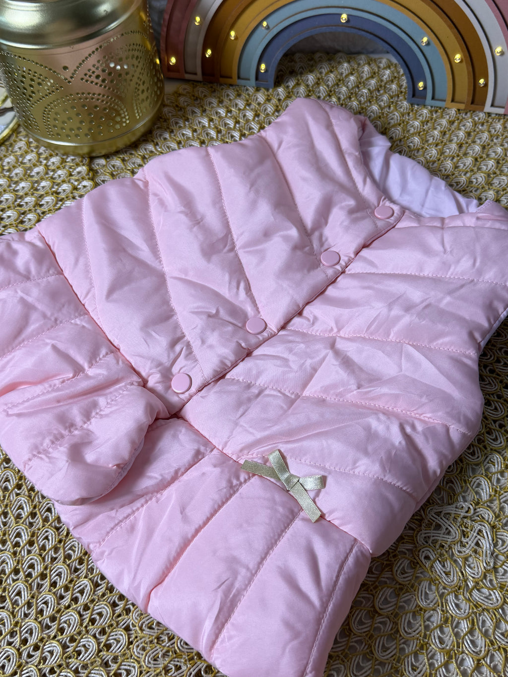 Chaqueta rosada lazo
