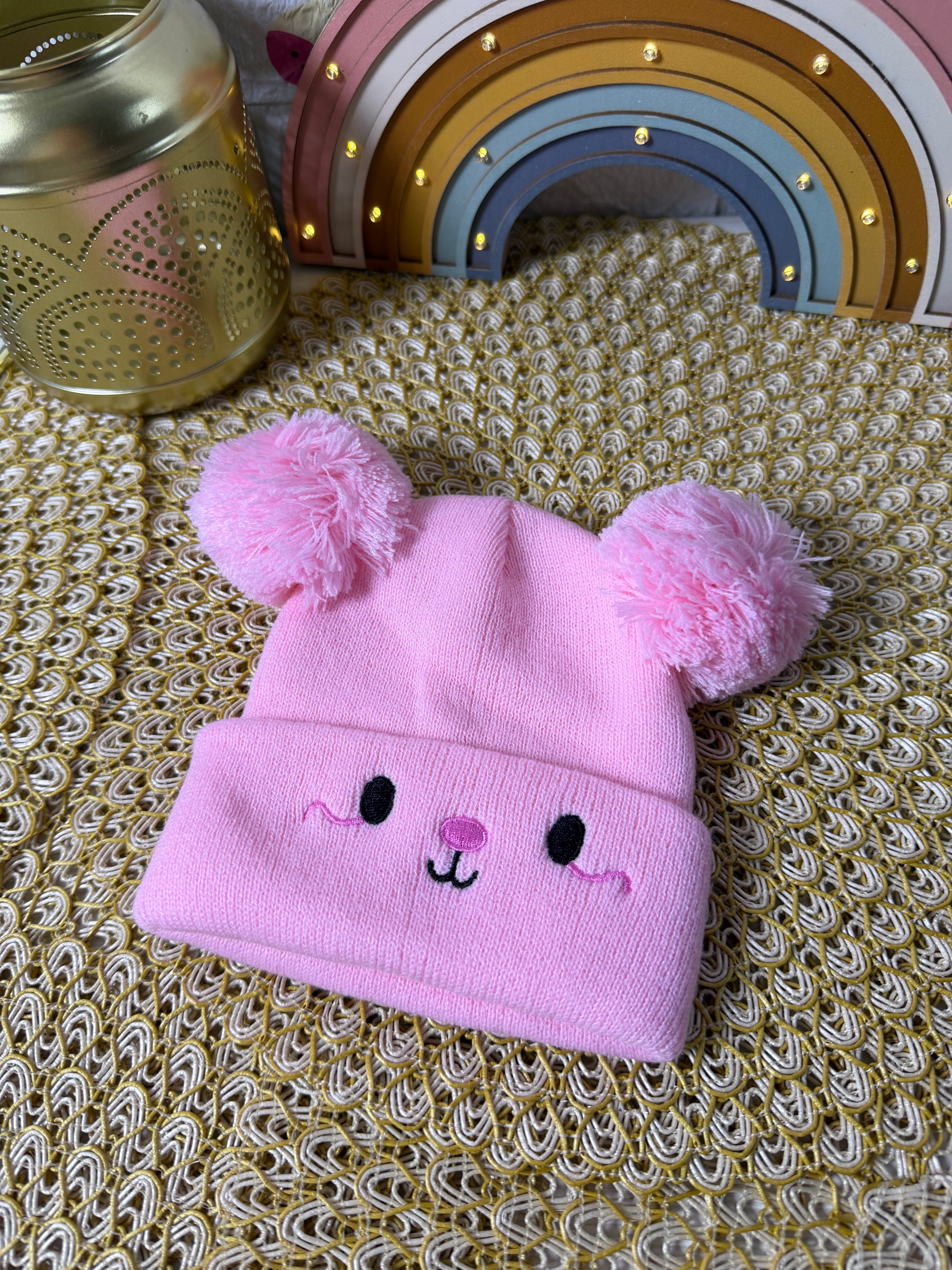 Gorro de punto bordado carita