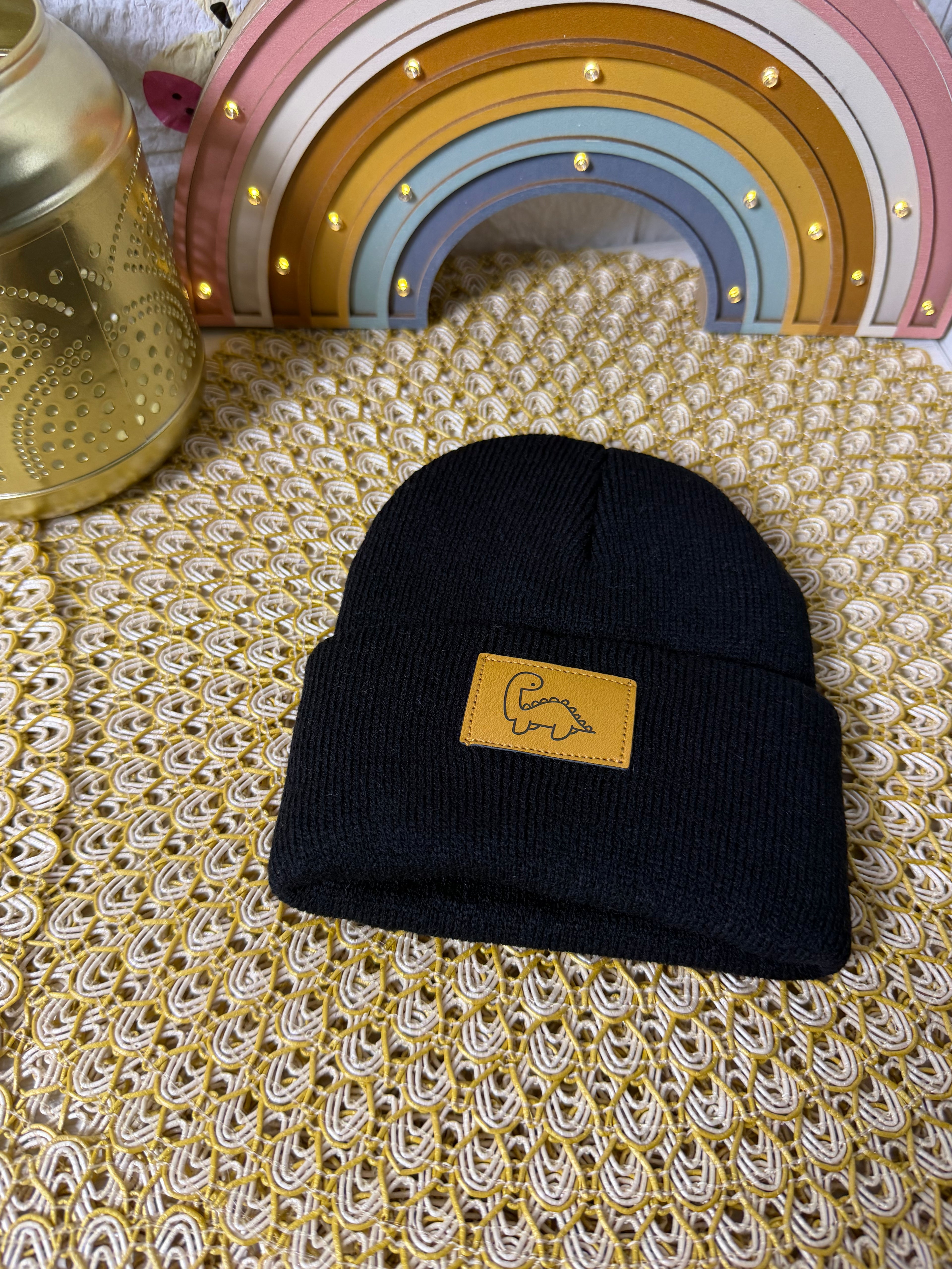 Gorro de punto dinosaurio etiqueta