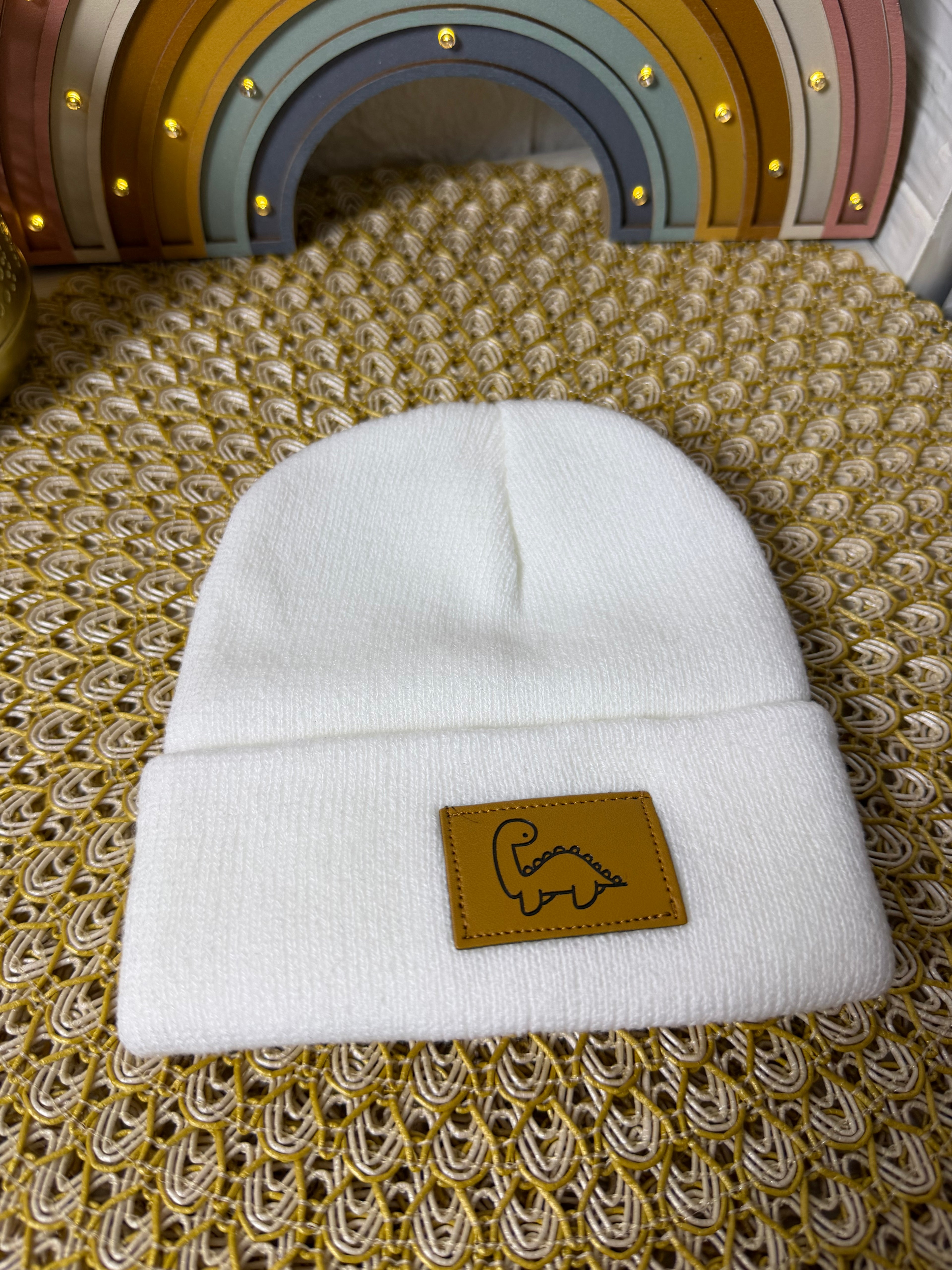 Gorro de punto dinosaurio etiqueta