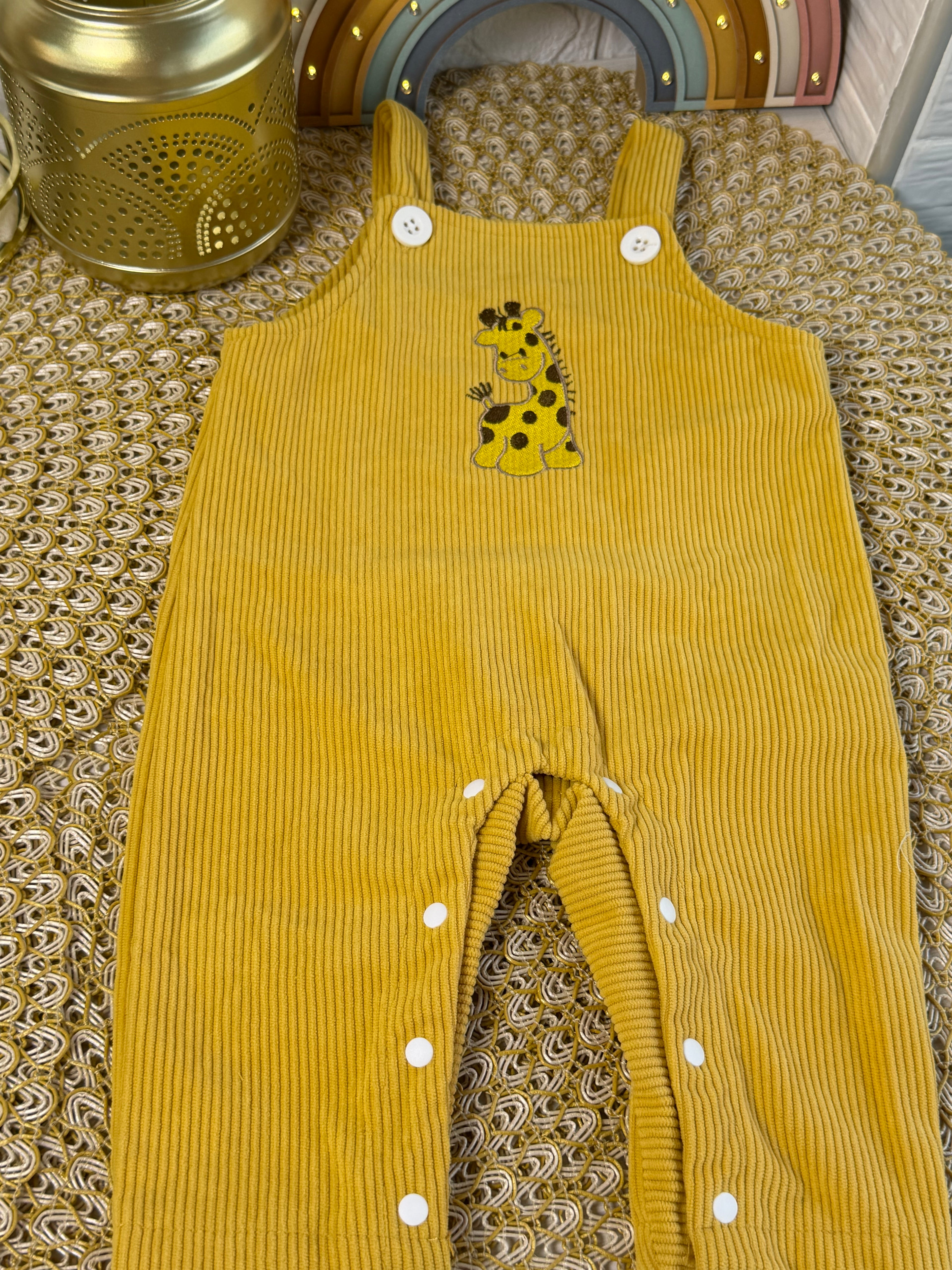 Overol amarillo jirafa