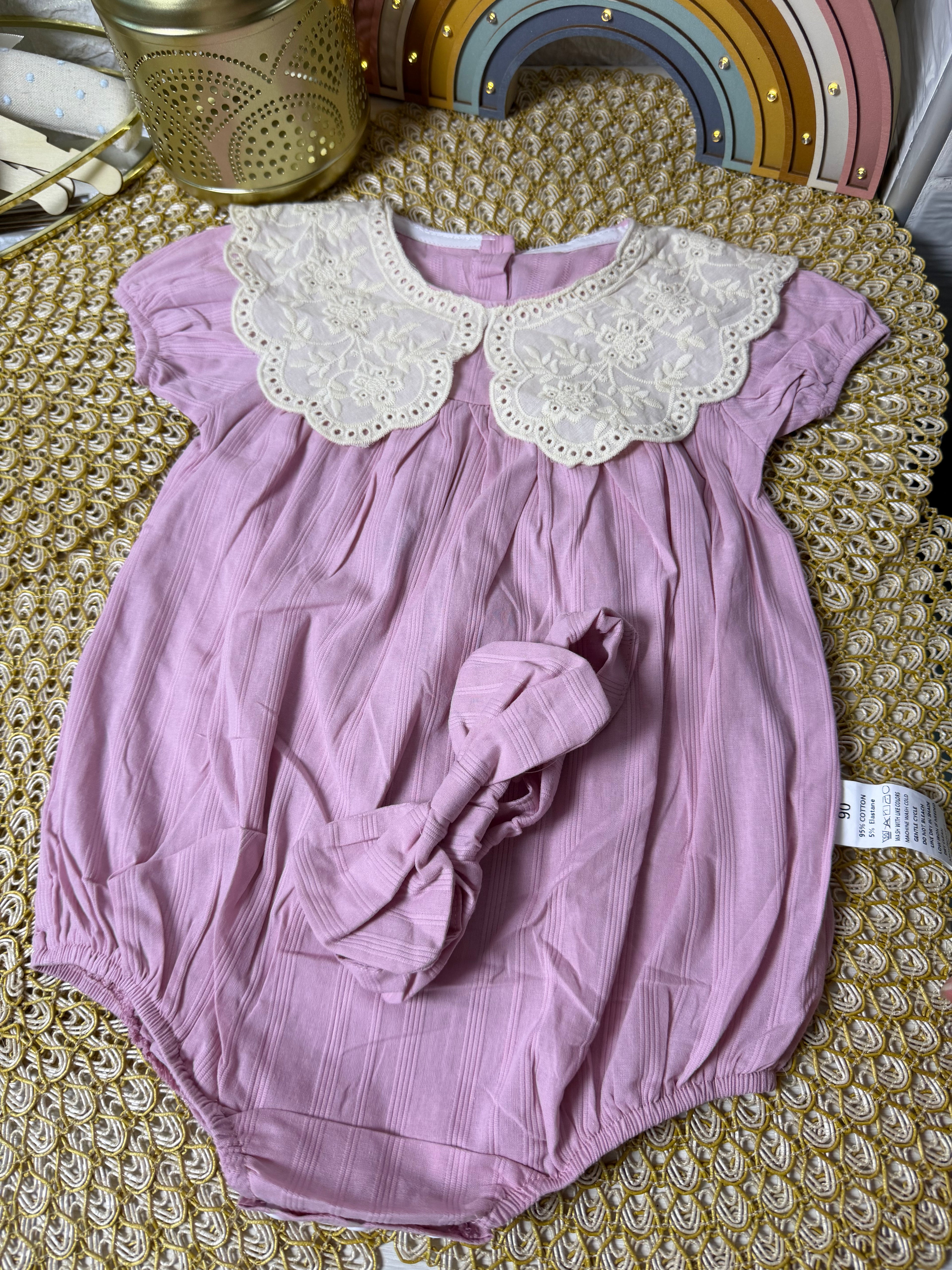 Body rosa con cuello labrado
