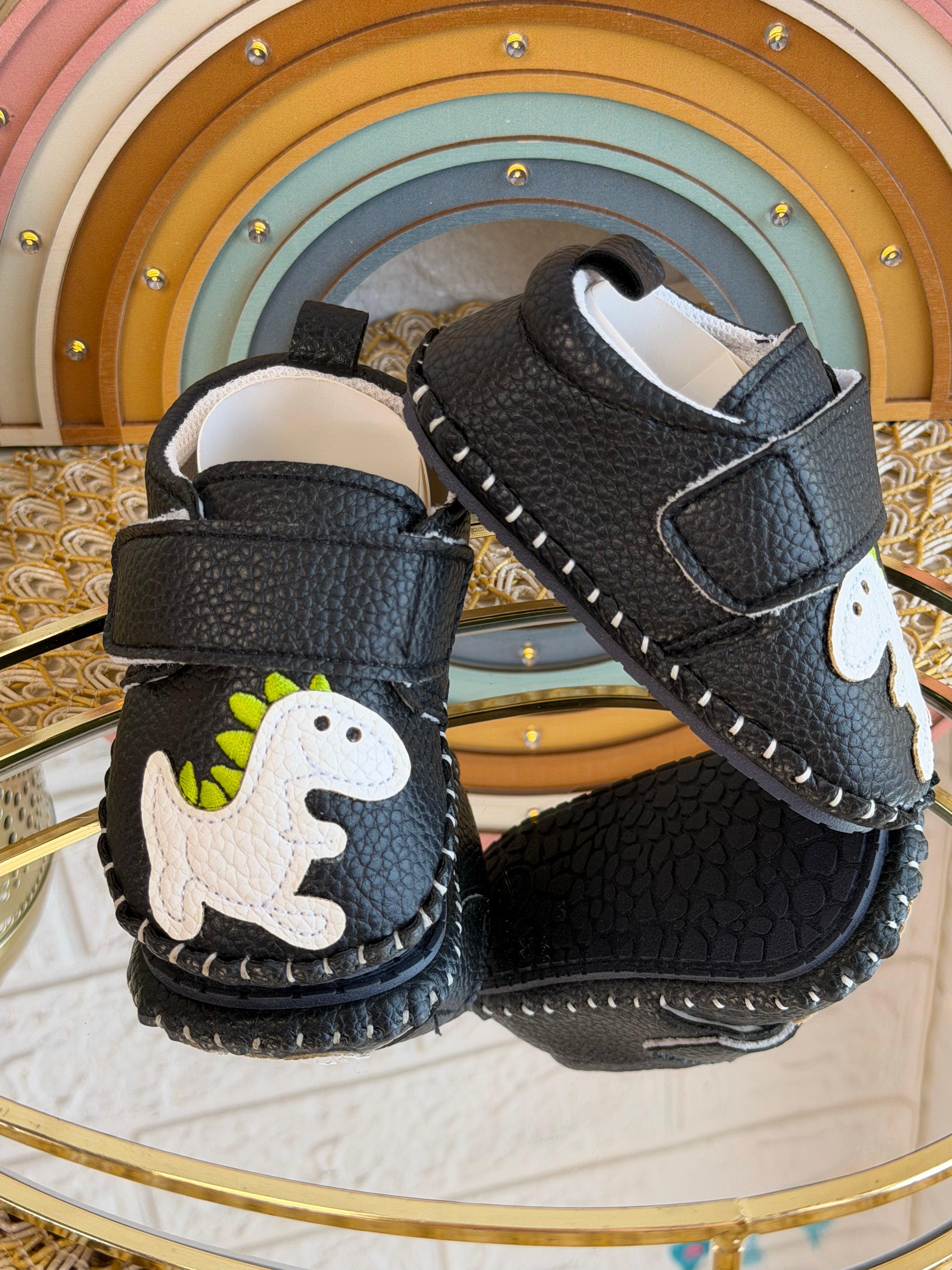 Zapatos para bebé dinosaurio