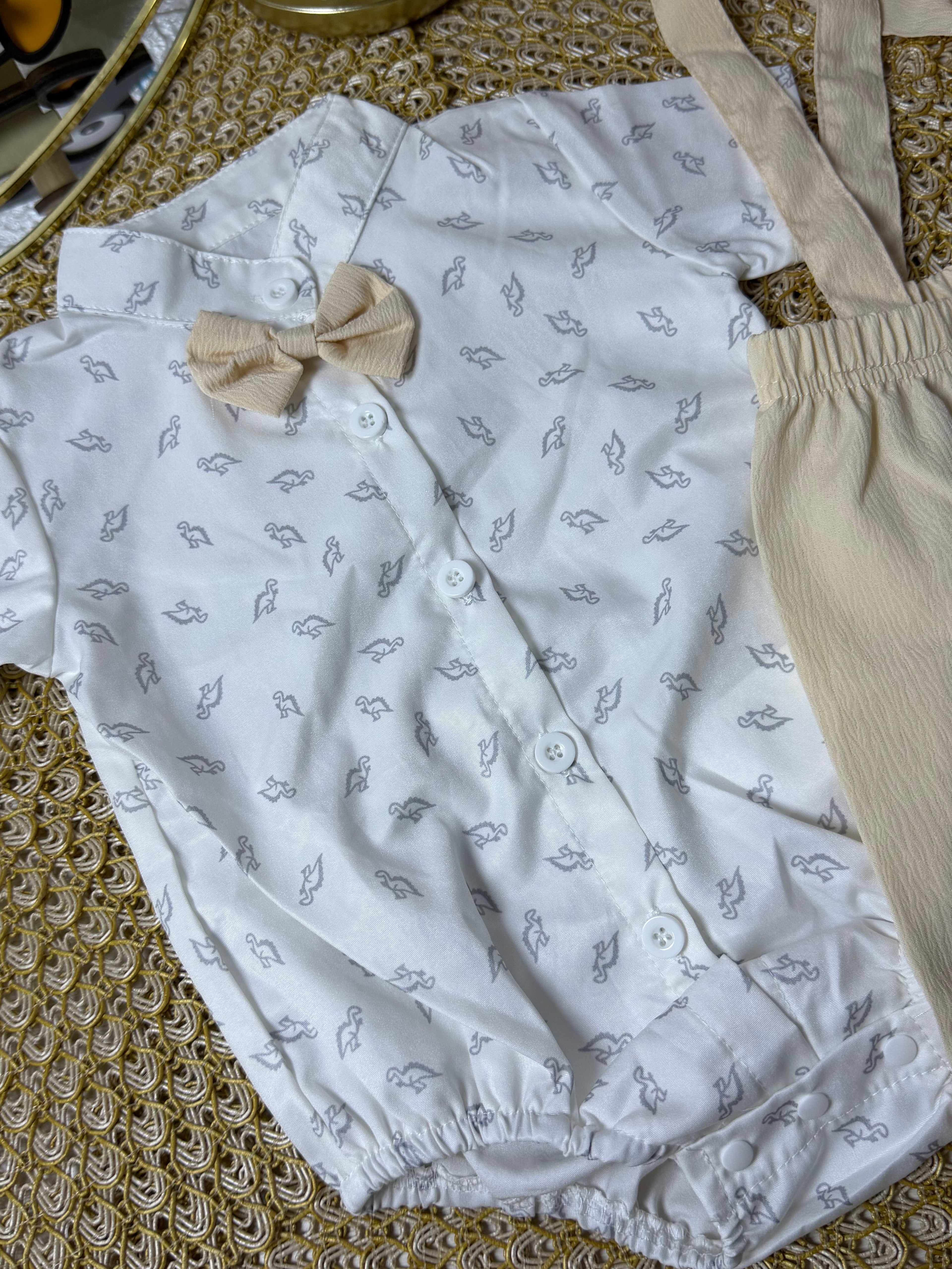 Conjunto 2 piezas beige dinosaurio