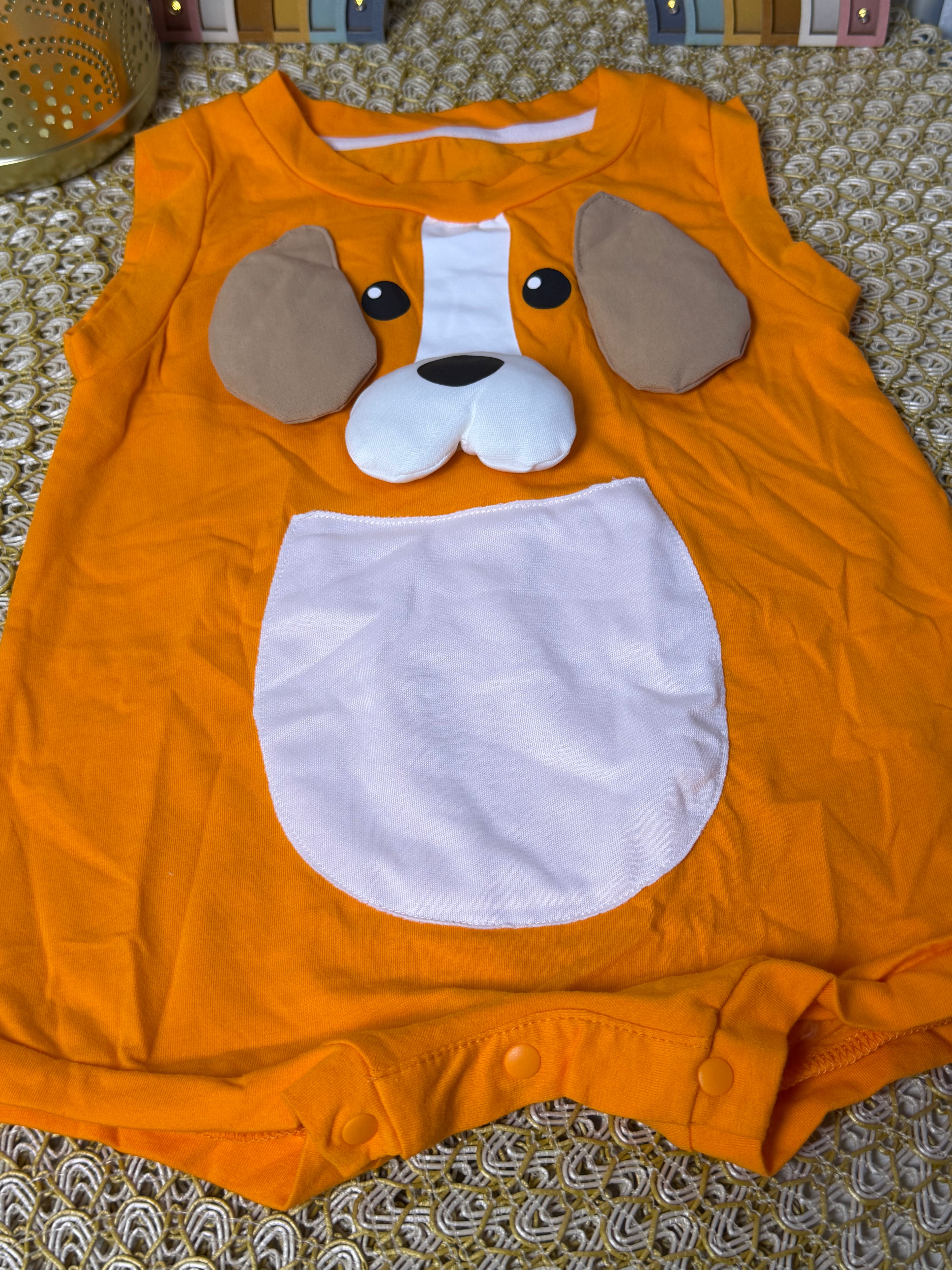 Enterizo naranja perrito