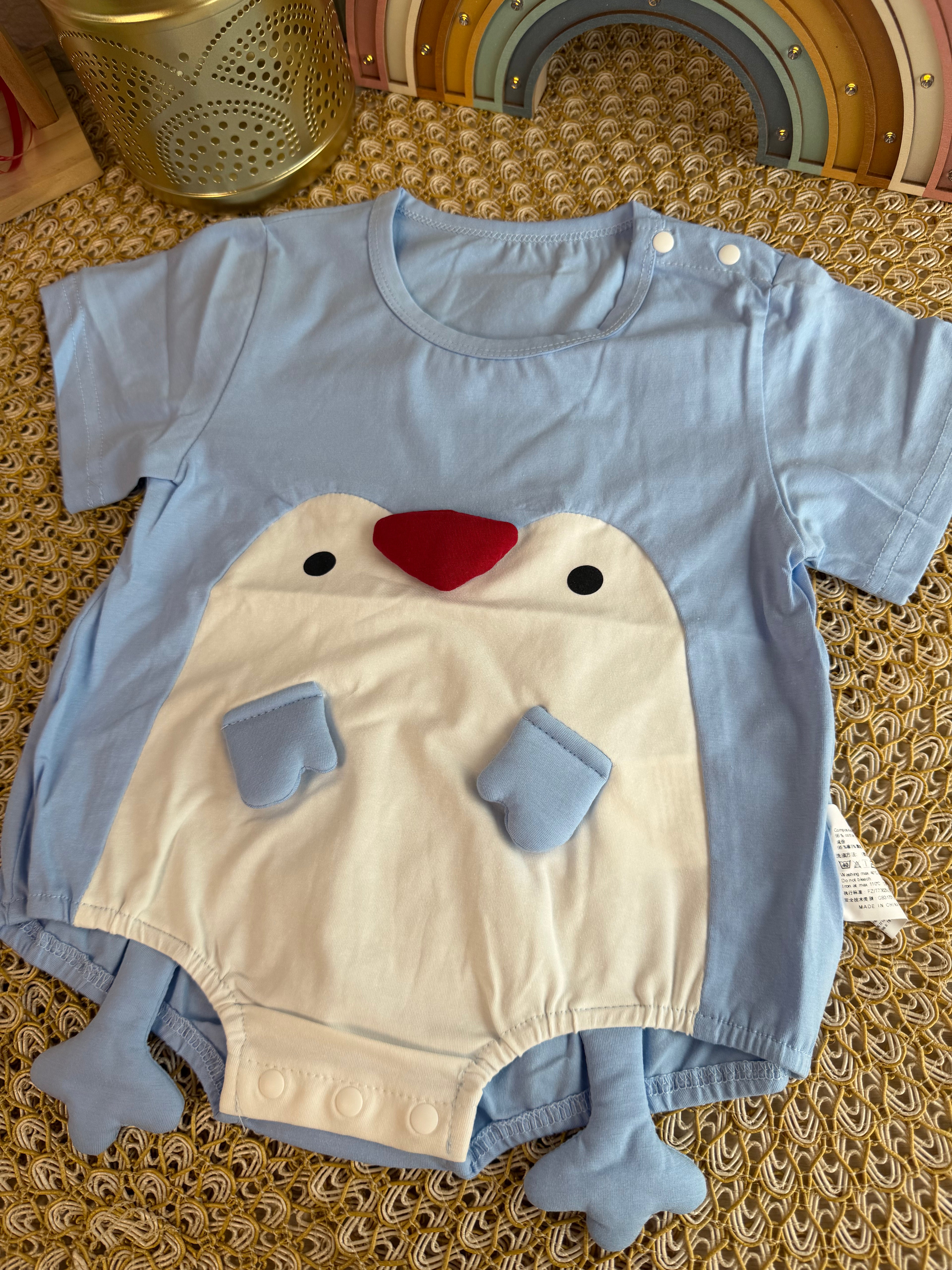 Enterizo pingüino celeste