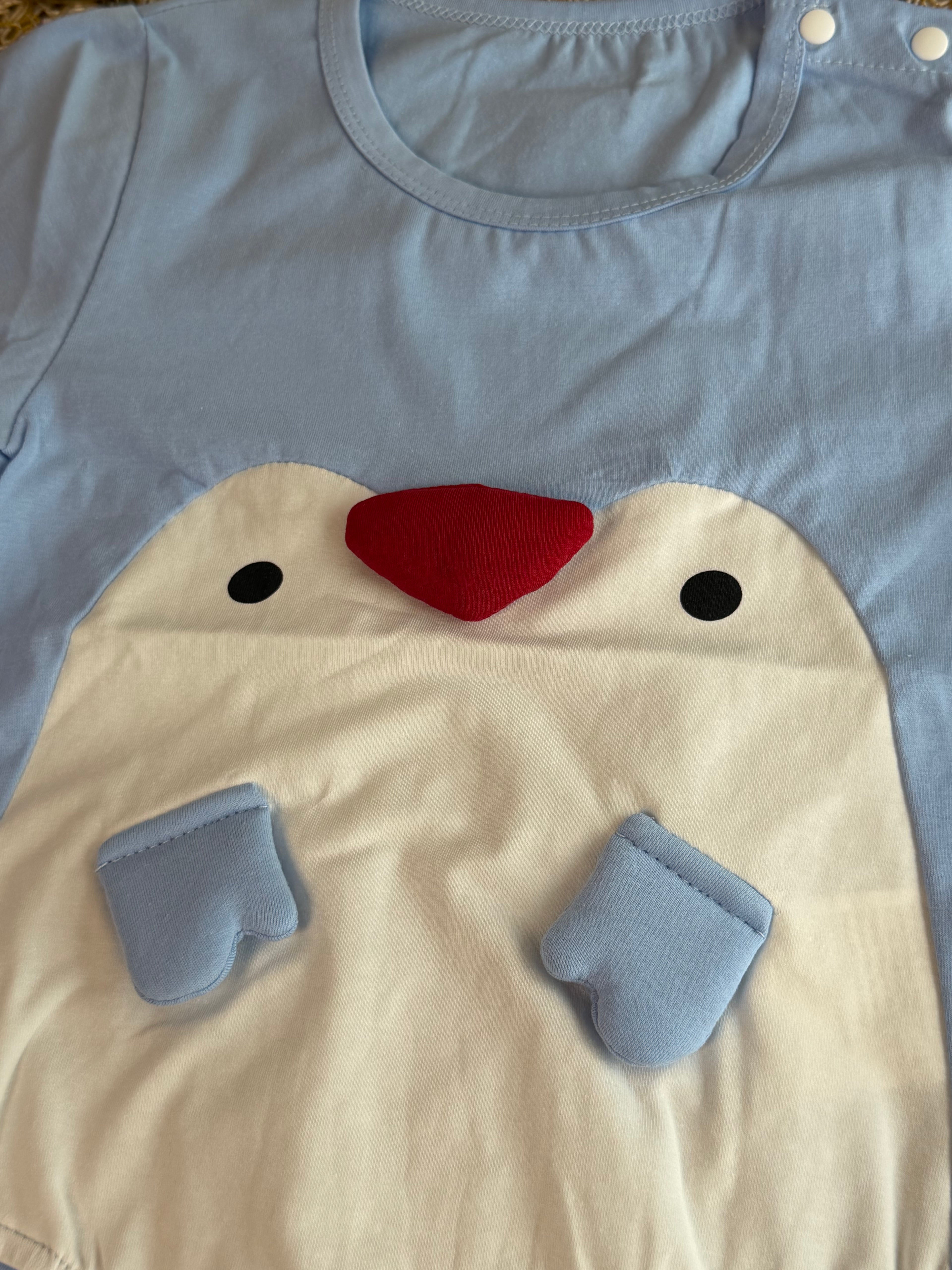 Enterizo pingüino celeste