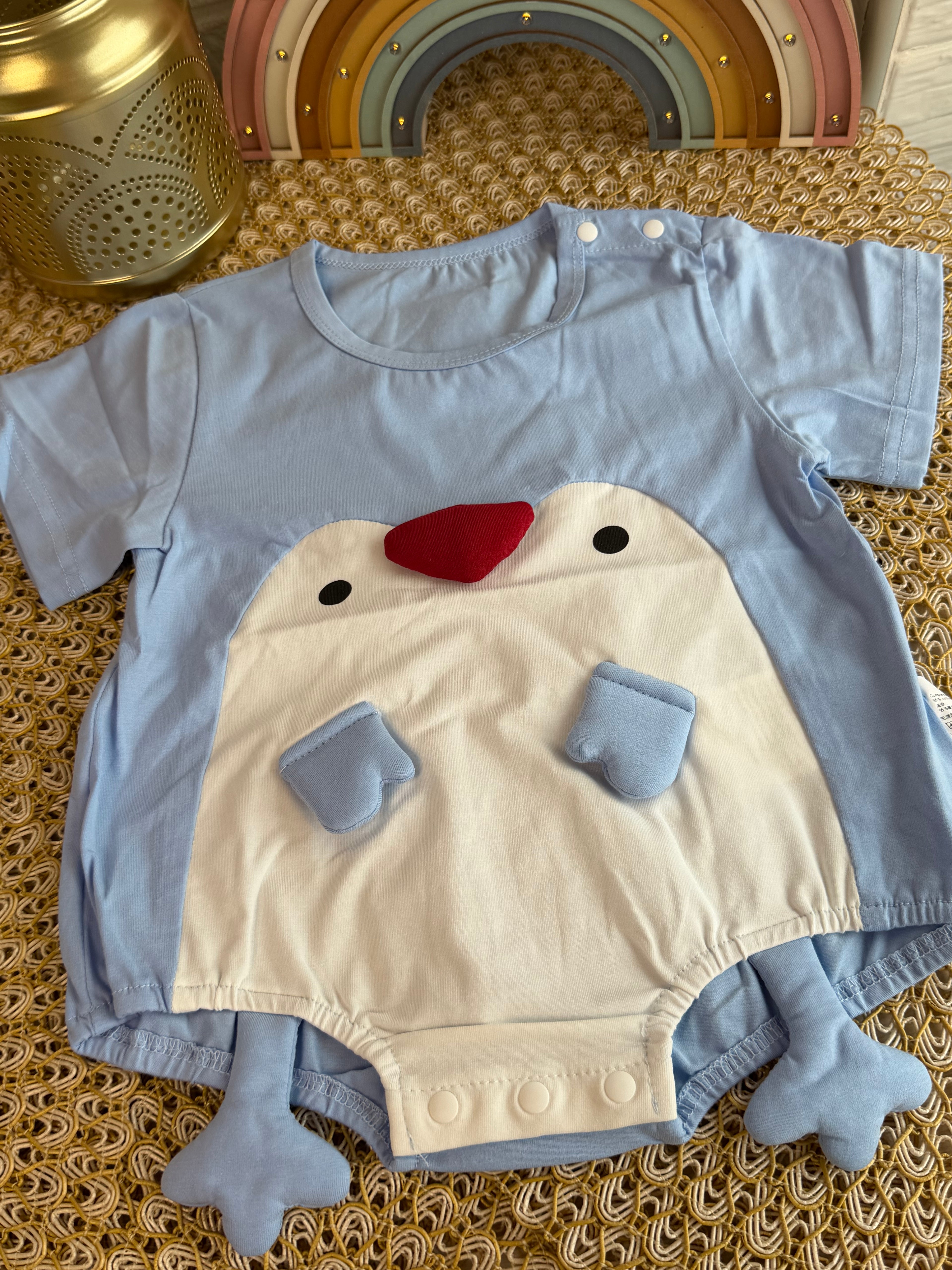 Enterizo pingüino celeste