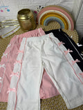 Pantalón liso con lazos