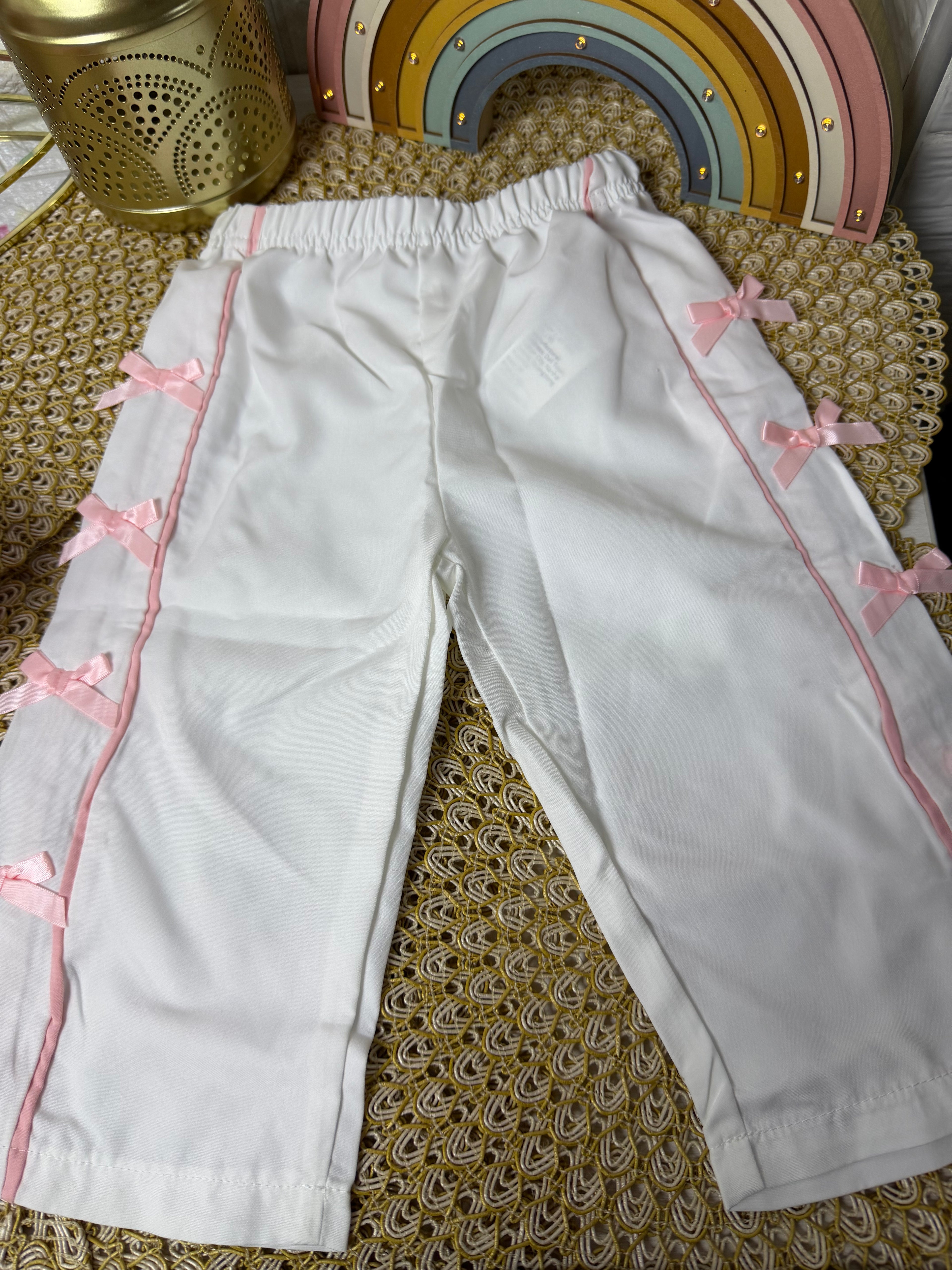 Pantalón liso con lazos