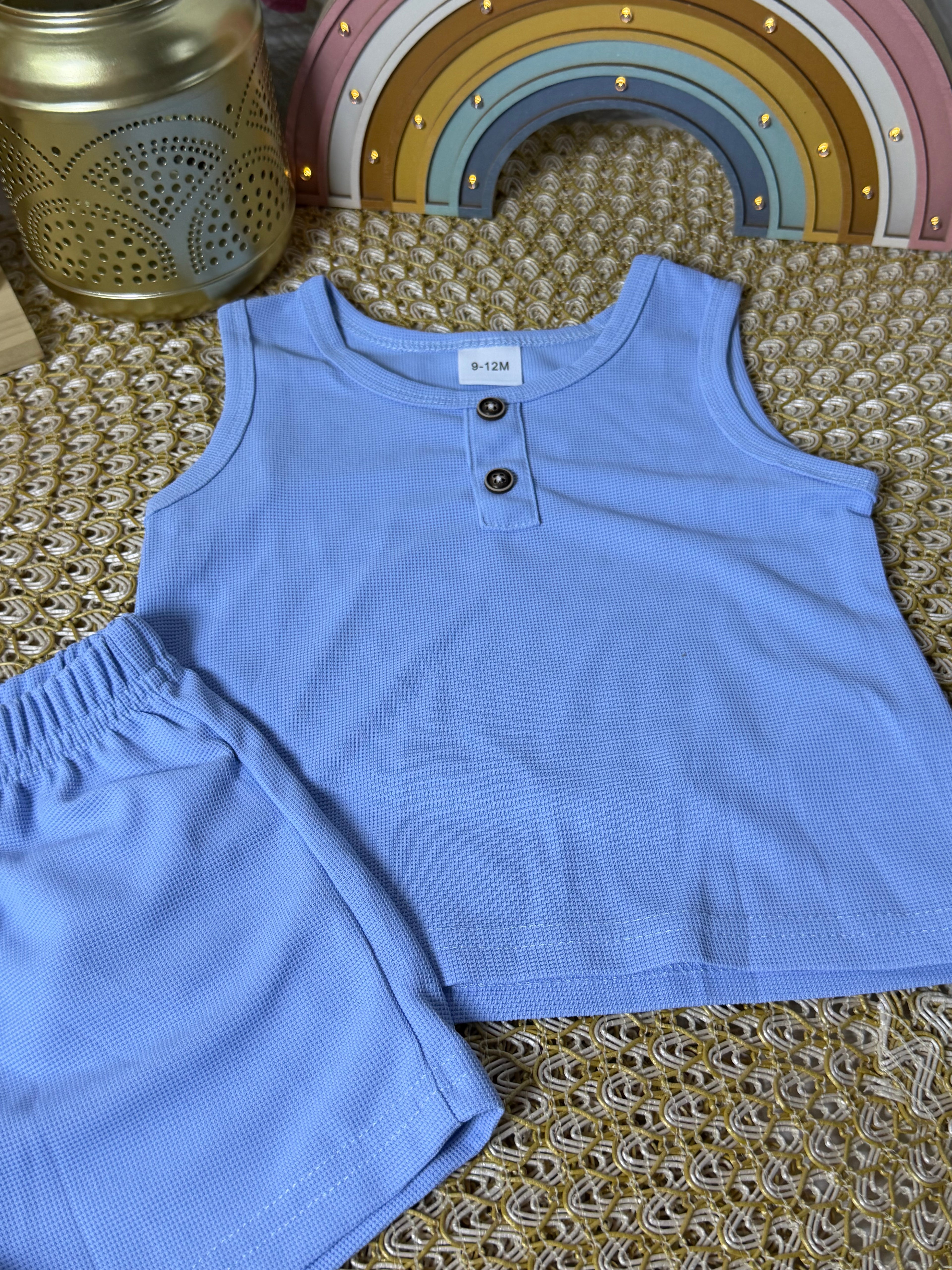 Conjunto 2 piezas corto celeste
