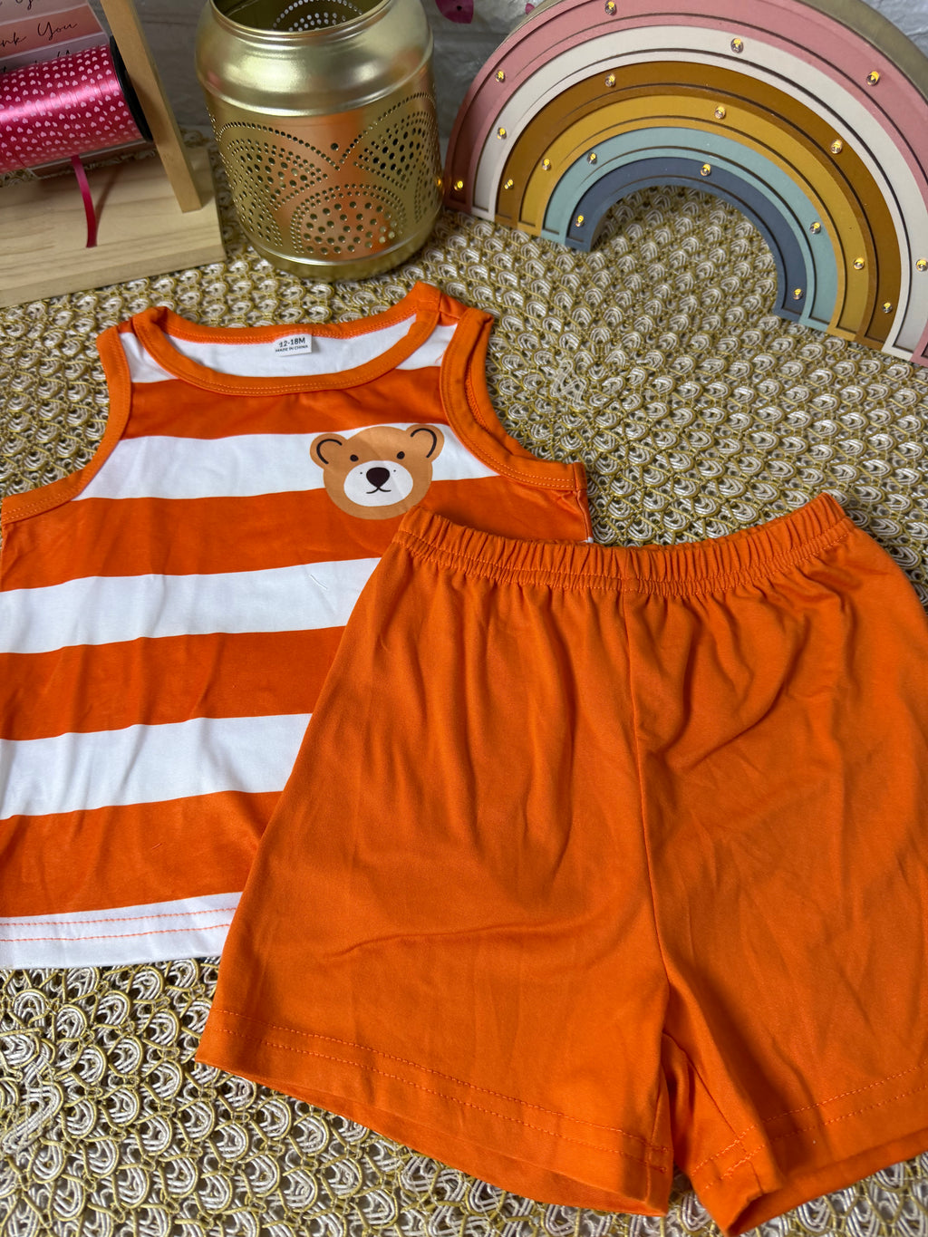 Conjunto 2 piezas corto naranja a rayas