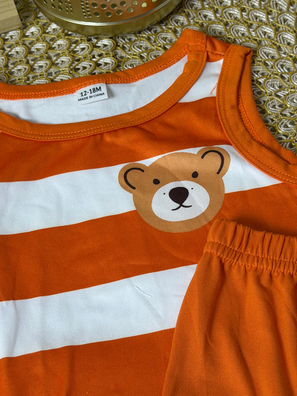 Conjunto 2 piezas corto naranja a rayas