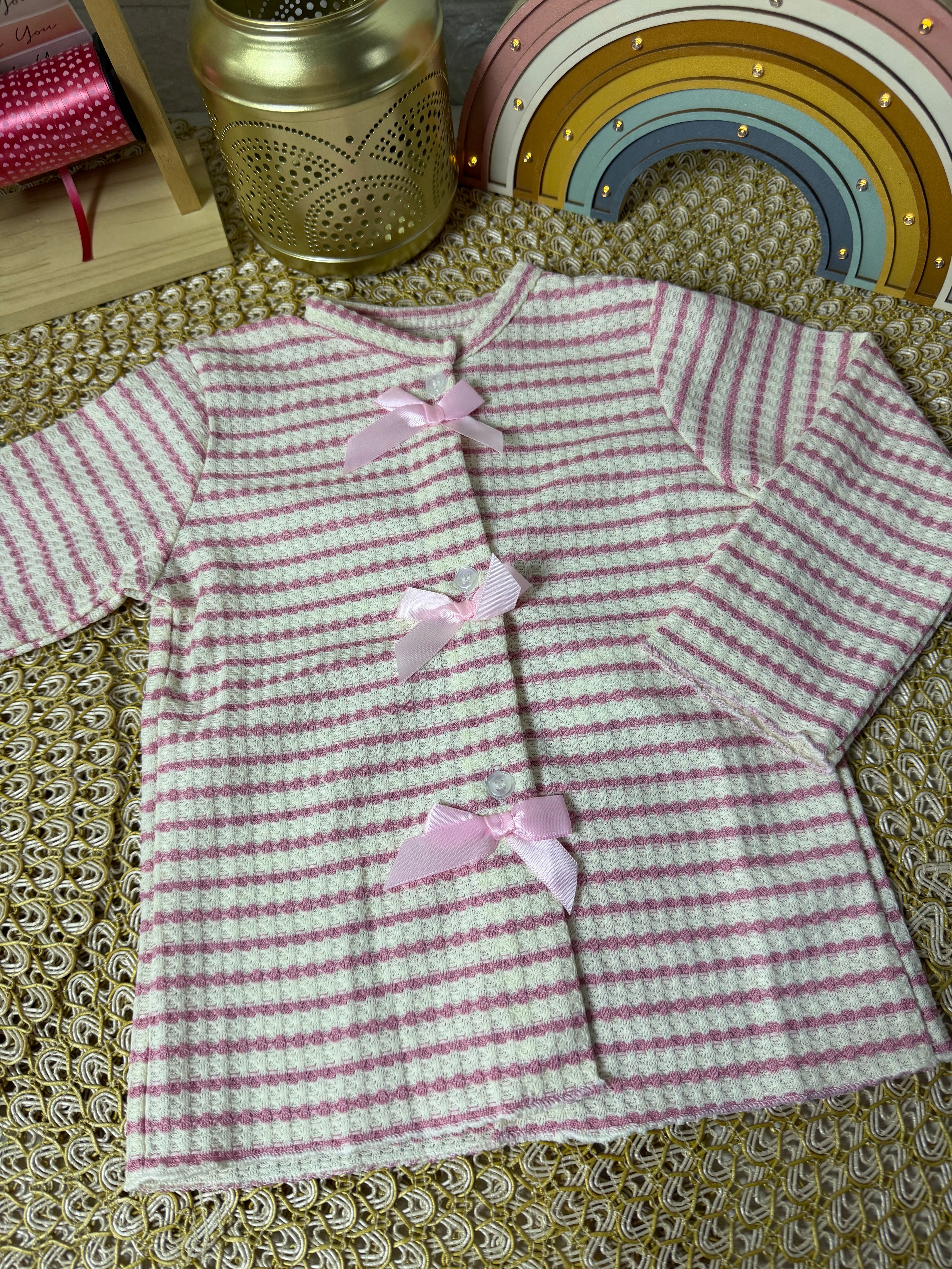 Cardigan de punto a rayas rosa