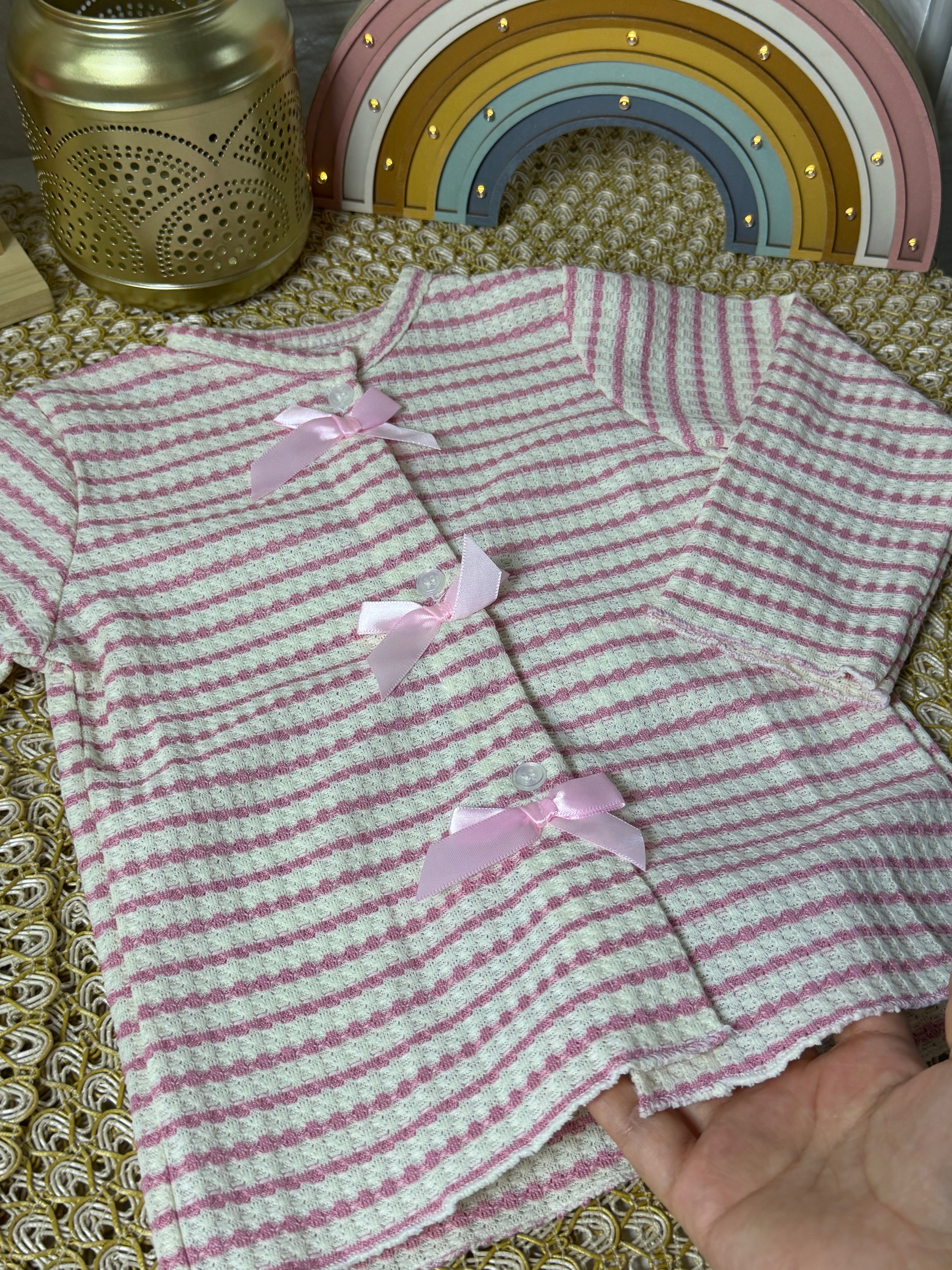 Cardigan de punto a rayas rosa