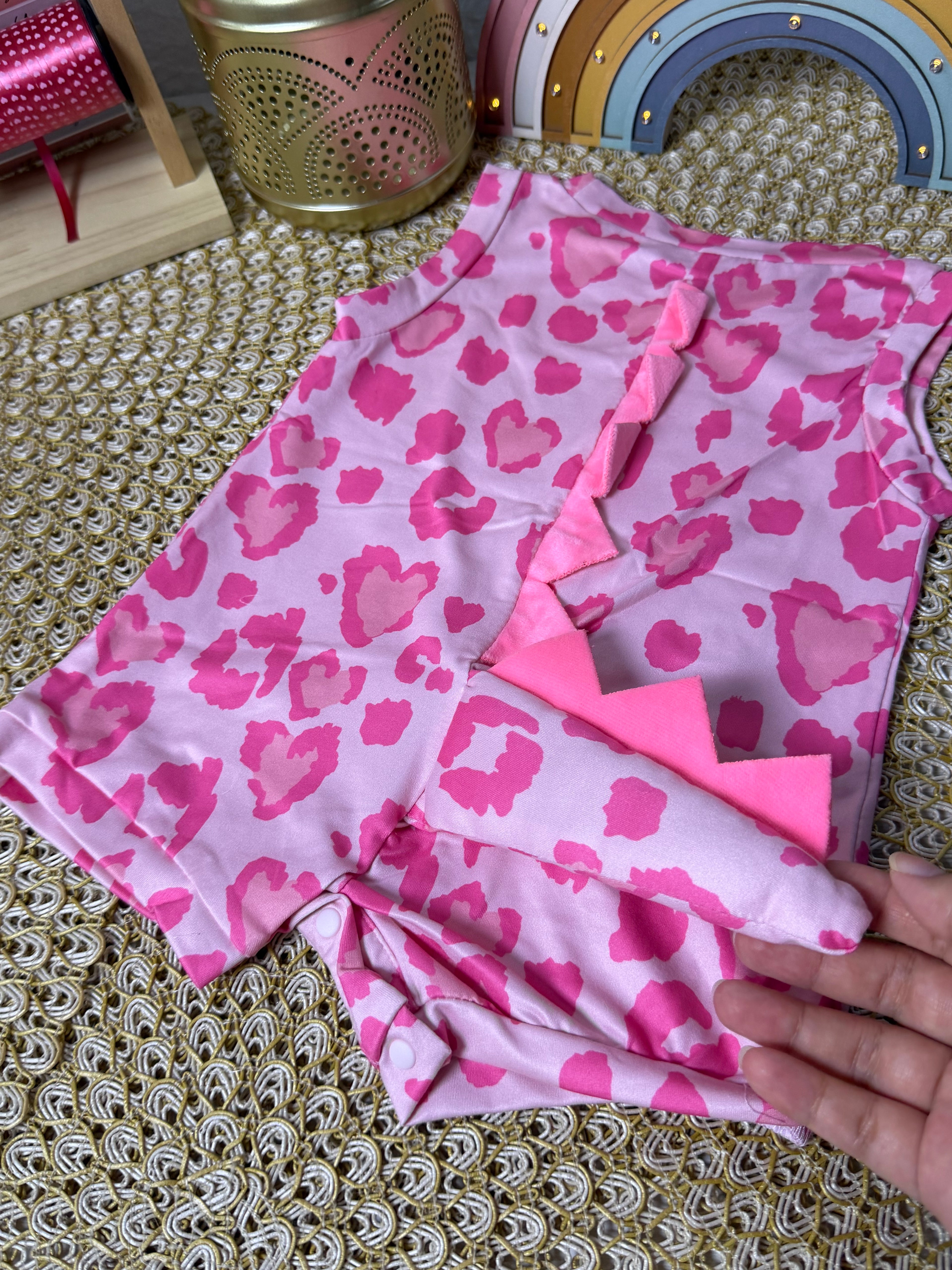 Enterizo dinosaurio rosa