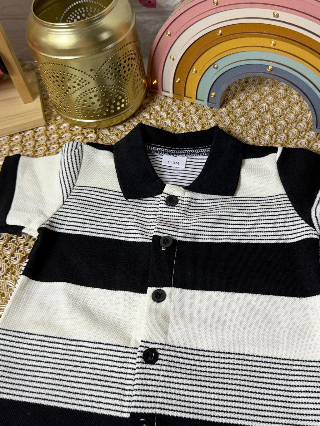 Enterizo negro con blanco a rayas